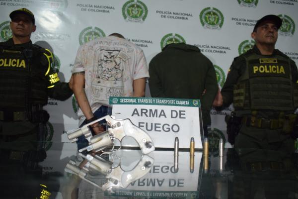 Capturados y arma de fuego